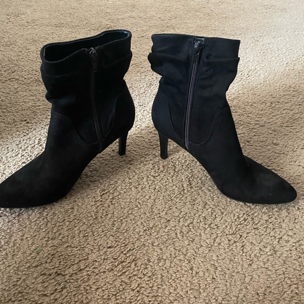 Black high heel boots with zipper